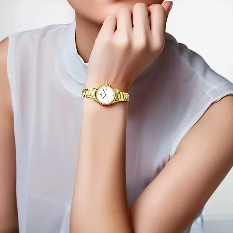 Titan Karishma 2572YM01 White Dial Gold-Tone Ladies Watch